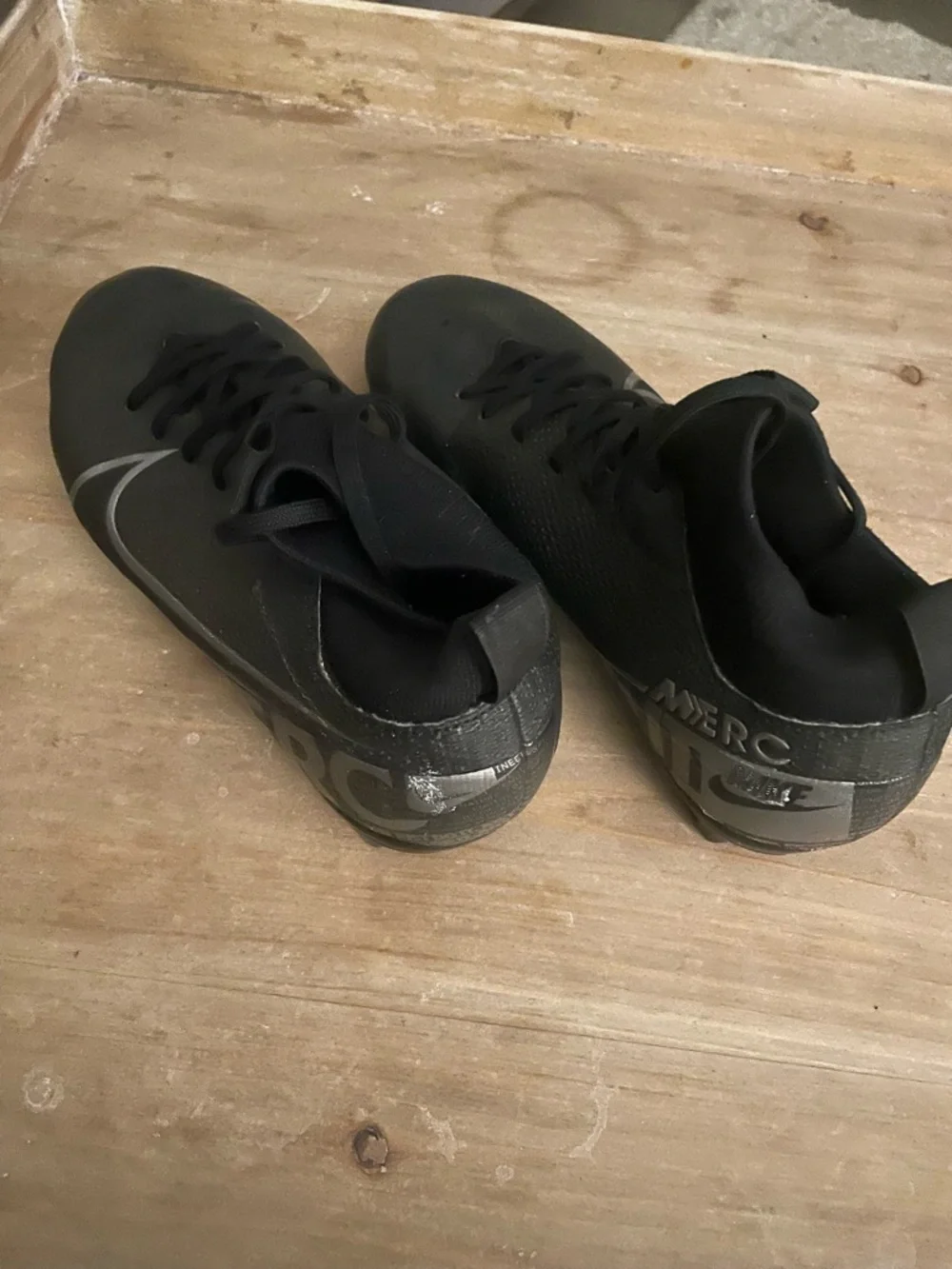 Nike Kids Black Sneakers with Silver Swoosh